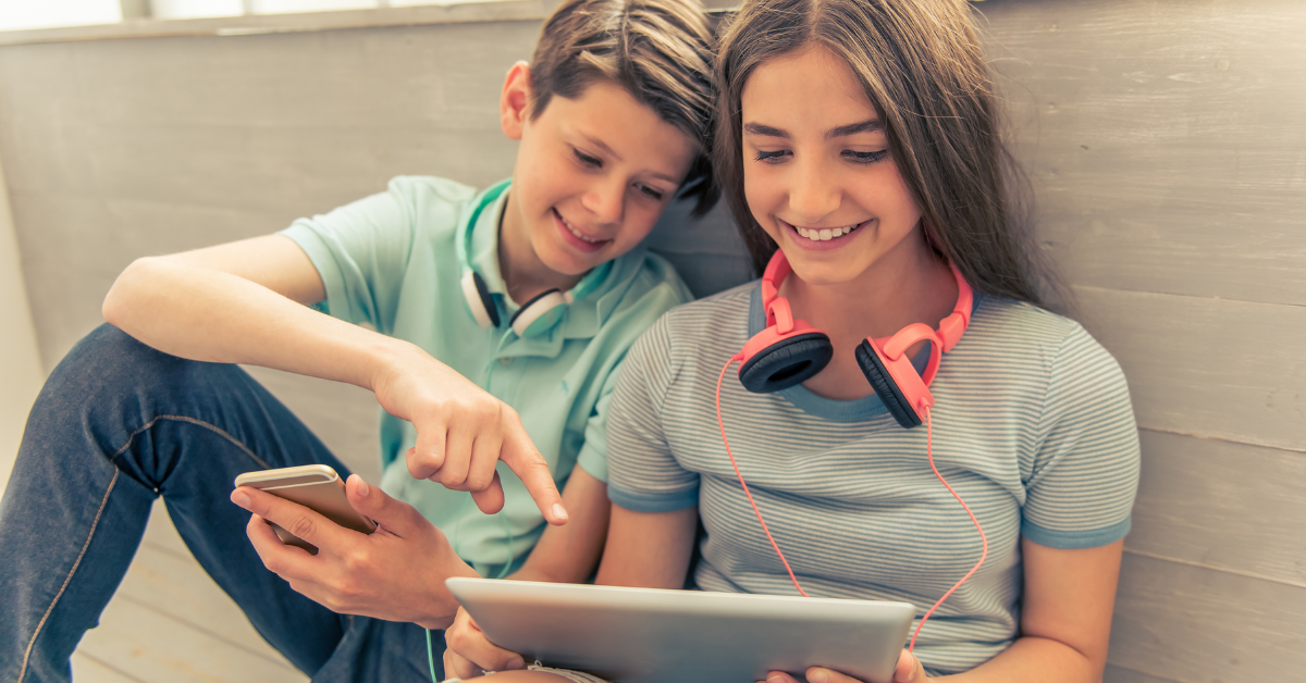 Children using a tablet and a phone